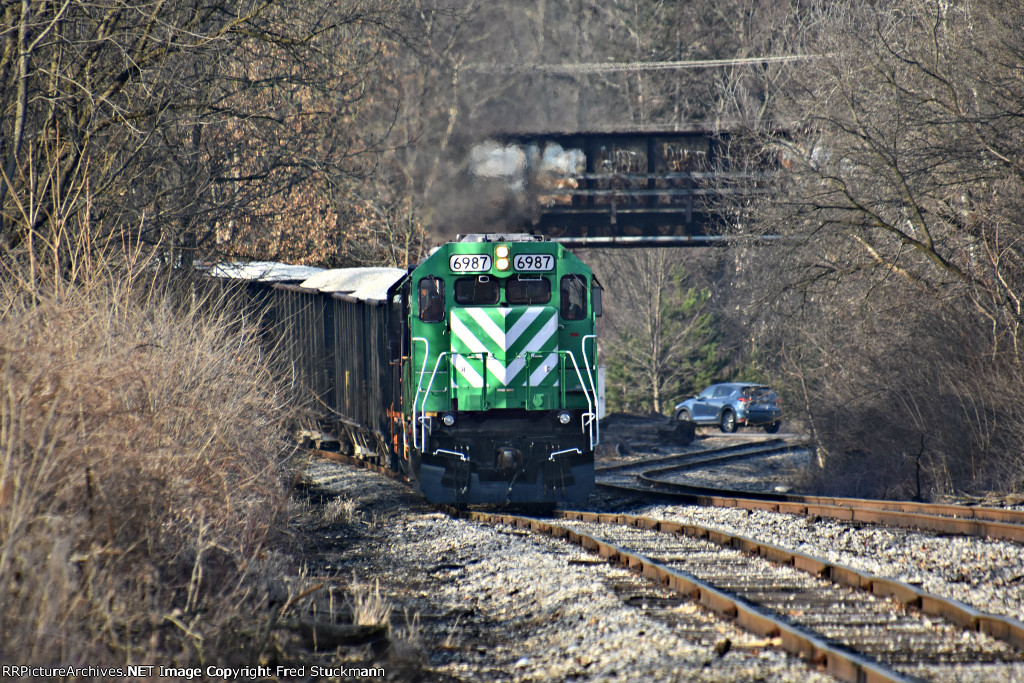 WE 6987 with the stone in plain sight now. Also, that bridge is the Wheeling main.